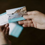 Person holds Martha's Vineyard business card brand voice piece